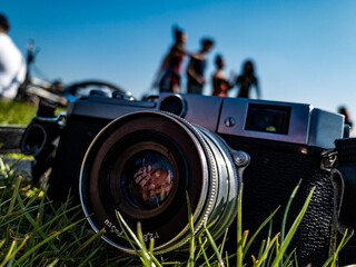 a film camera on the grass