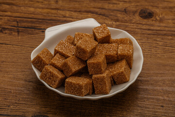 Cane sugar cubs in the bowl