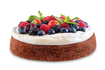 Cake with cream cheese frosting, mint leaves and berries jn a white isolated background
