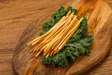 Chechel cheese sticks over board