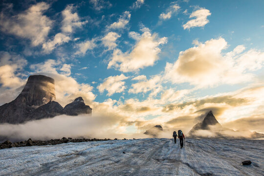 Climbers approach Mt. Asgard and Mt. Loki via the Caribou Glacier.