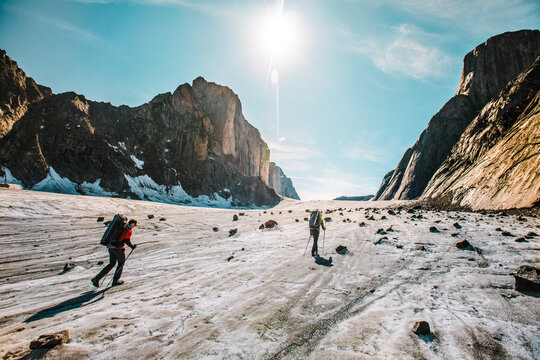 Rear view of explorers crossing the Parade Glacier, Baffin Island.
