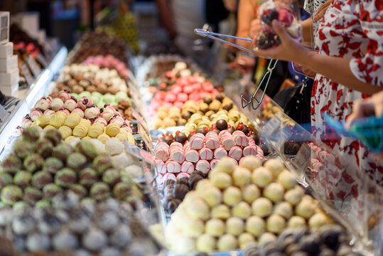 Marzipan and chocolate sweets at christmas tradition market at Budapest. Selective focus.