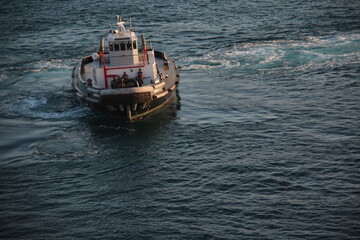 Tug boat out in ocean waters