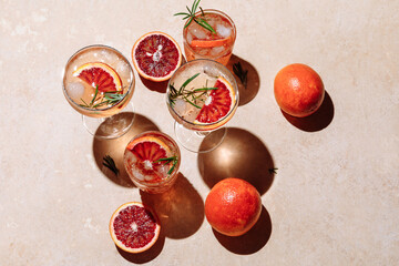 Summer cocktails with blood orange, grapefruit and rosemary