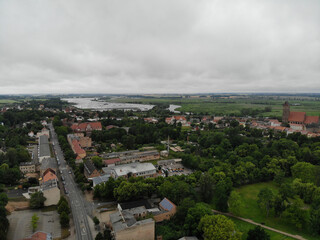 Fototapeta premium Aerial view of hanseatic league Anklam a town in the Western Pomerania region of Mecklenburg-Vorpommern, Germany. It is situated on the banks of the Peene river.