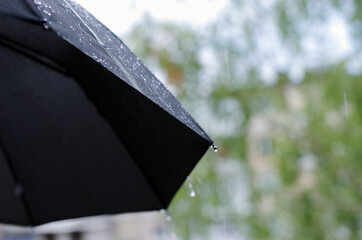umbrella and rain drops closeup
