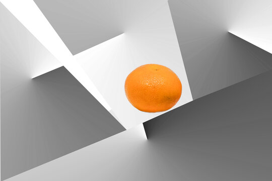 Orange at the center of a conically lit monochrome space