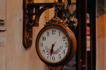 Retro style wall clock. Vintage colors.