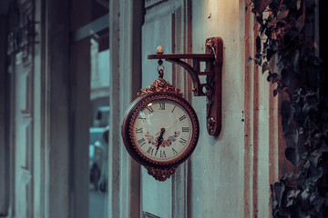 Retro style wall clock. Vintage colors.