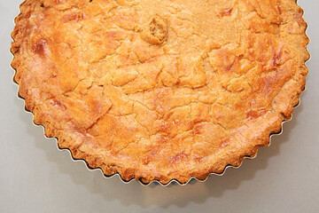 homemade pie in gray background