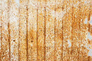 Old rusted metal surface with corrosion stains texture background.