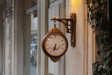 Retro style wall clock. Vintage colors.