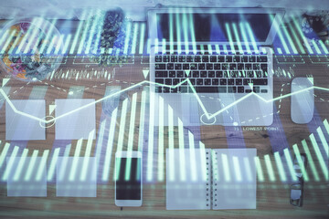Double exposure of data theme drawing hologram over topview work table background with computer. Concept of technology.