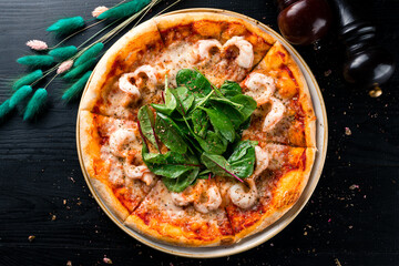 italian pizza shrimp and chard leaves top view, flat lay