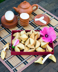 Tea time. Chinese Fortune Cookies, Teapot and Cups
