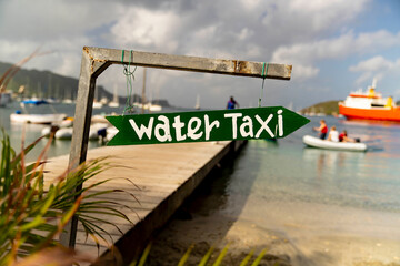 Fototapeta na wymiar Handmade sign for water taxi on island of Bequia in the Caribbean 