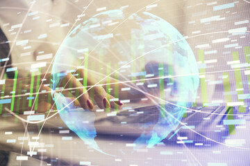 Multi exposure of woman hands typing on computer and business theme hologram drawing. Success concept.