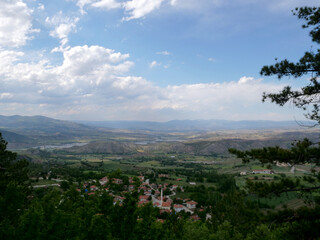 Fototapeta na wymiar clouds and sky. beautiful view from the valley. Small towns and villages below