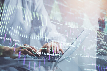 Double exposure of woman hands typing on computer and forex chart hologram drawing. Stock market invest concept.