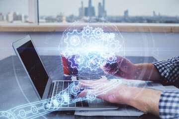 Double exposure of man hands holding a credit card and data theme drawing. E-commerce and technology concept.