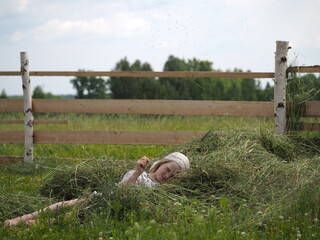 Village child in the hayloft