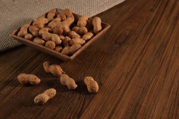 Peanut composition serving to make oil, peanut butter. Great for healthy and dietary nutrition. Concept of: condiments, dried fruits, food