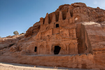 Ancient tombs carved in stone in Petra, Jordan