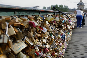 Paris, France - Love locks. Thousands of locks on bridges over the river symbolize eternal love.