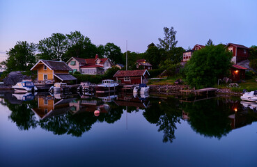 Obraz premium Evening fishing one beautiful evening at a jetty in one of Vaxholm's bays