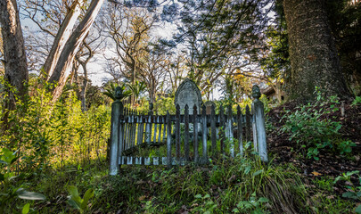 An old grave in historical Grafton cemetery in Auckland New Zealand