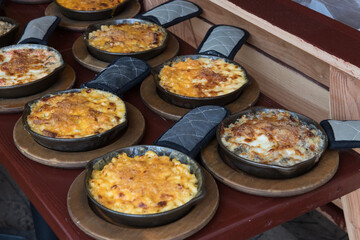 Homemade Baked Mac and Cheese on wooden table