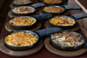 Homemade Baked Mac and Cheese on wooden table