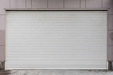 White Automatic shutters door in a house