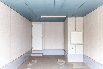 Perspective of Empty white basement concrete room.