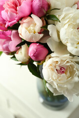 Bouquet of beautiful fresh peonies indoors, closeup