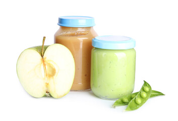 Jars with baby food, fresh pod with peas and apple on white background