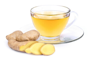 Closeup hot ginger herbal tea in glass cup with fresh organic ginger root with slice isolated on...