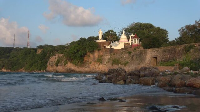 View of the ancient Buddhist temple Gokanna Rajamaha Viharaya on the territory of Fort Frederick. Trincomalee, Sri Lanka
