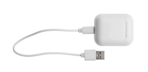 USB charge cable and wireless earphone case on white background. Modern technology