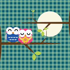 Two cute owls on the tree branch. Vector illustration