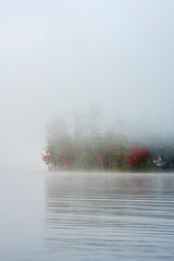 Fog on the lake in autumn