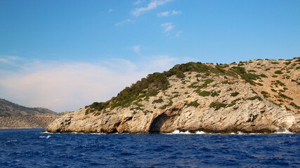 Fototapeta na wymiar Symi island, rocky seashore, the Aegean Sea, Greece