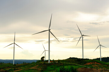 Obraz premium The windmill on the top of the mountain.