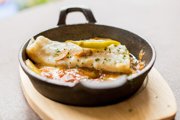 Pasta dish with sauce on a white background