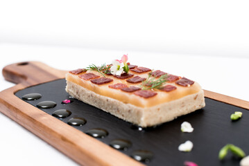 A plate with Iberian ham with flowers