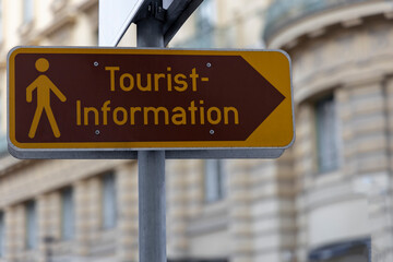 Brown tourist information sign .in the center of Austria.