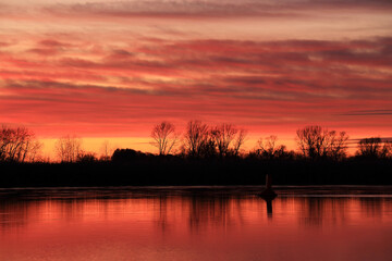 Colorful sunset by the Odra River, Poland.