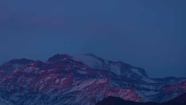 Timelapse of Andes mountains at dusk. Chile