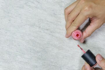 Nail painting work by hand, top view